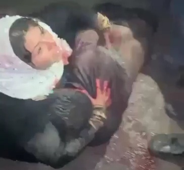 Syrian rebels beating innocent civilian to death in front of his wife 