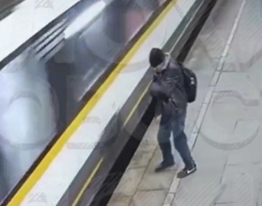 drunk man fell between a platform and a moving commuter train