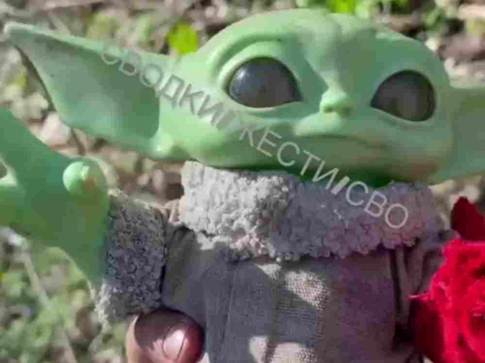 Baby Yoda checking on sleeping Ukrainian stormtroopers. 