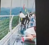 Chinese Tourists Accidentally Fall from a Glass Walkway