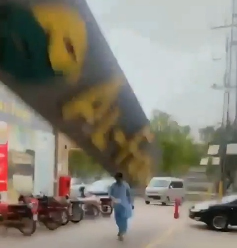 Store Hoarding Falls on Passerby In Lahore Storm