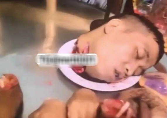 Gay Dude Decapitated. 