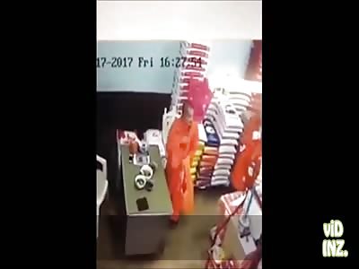 'A MONK' steals an iPhone and stashes it in his robe in Thailand