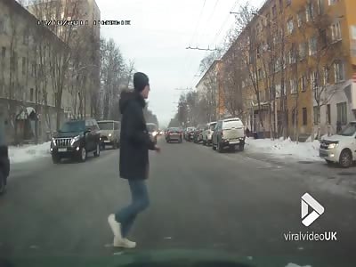 Pedestrian gets flipped in air at crossing