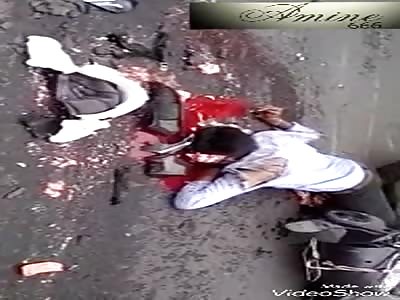 head shattered by the wheel of a truck