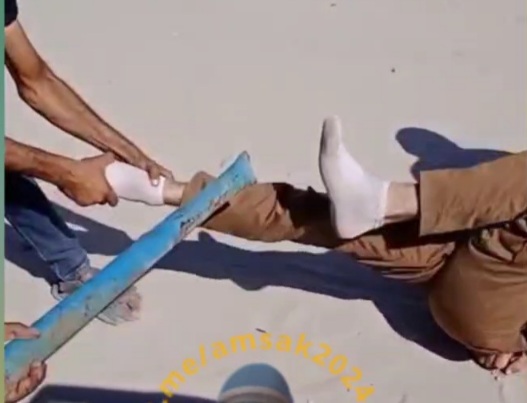 Another thief captured and gets his legs smashed by qassami fighters 