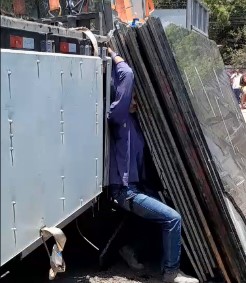 Man crushed by heavy marble slabs