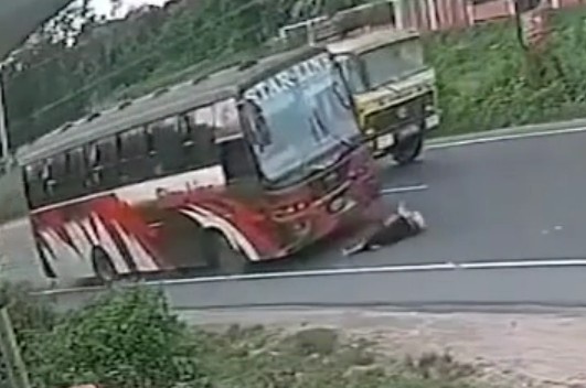 An attempt to cross a highway ends with a woman being killed by a bus
