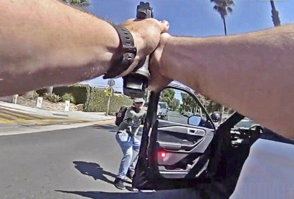 Unhinged man gunned down after charging officer with shovel 