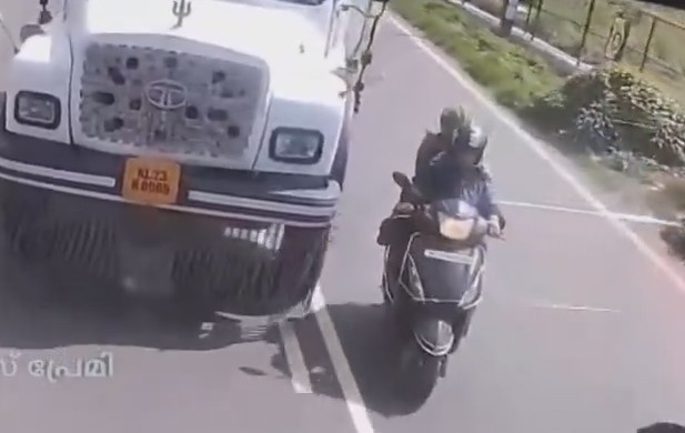 Woman Falls From Scooter, Gets Run Over By Truck