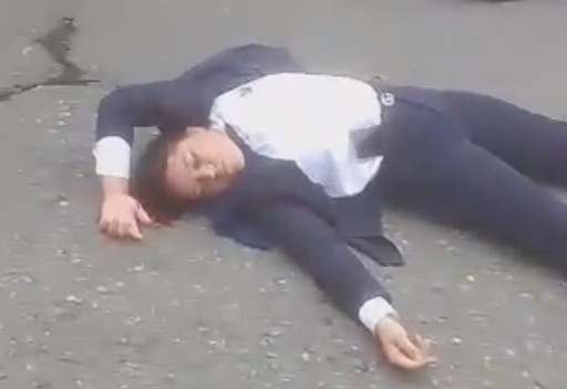 Man Suffers Seizure After Falling Head First on Asphalt