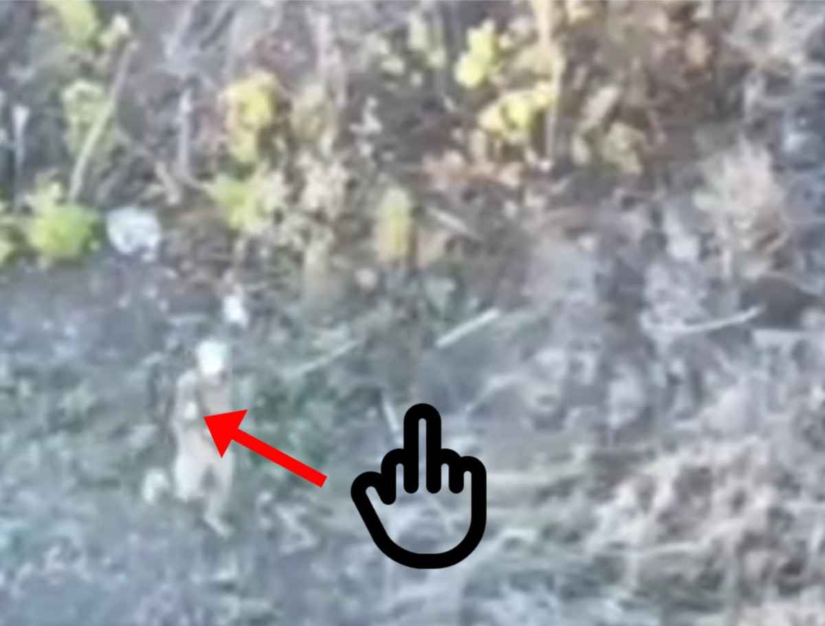 He gives the Russian drone the finger. 