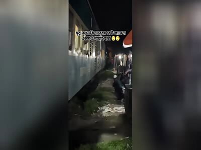 WATCH THIS MAN SLIPS AND SLIDES UNDER TRAIN