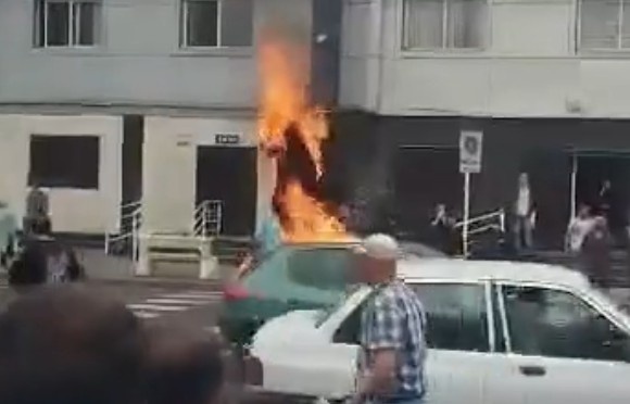 MAN SETS HIMSELF ON FIRE IN PROTEST