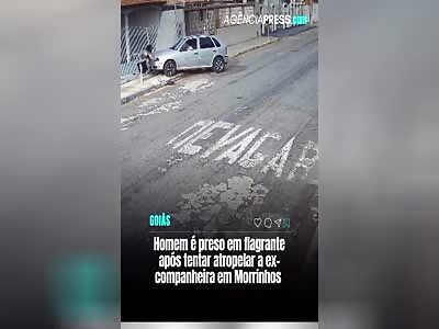 MAN TRIES TO KILL EX-WIFE BY RUNNING HER OVER