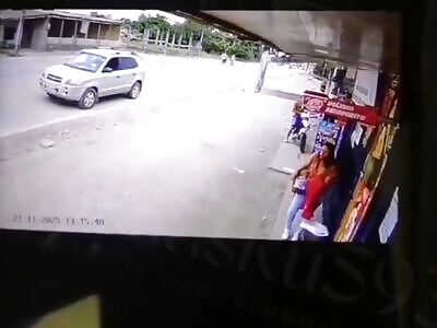 SHOT DEAD WHILE SHOPPING