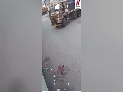 THERE'S A TRUCK ON TOP OF A GUY