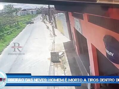 GUNNED DOWN WHILE DRIVING