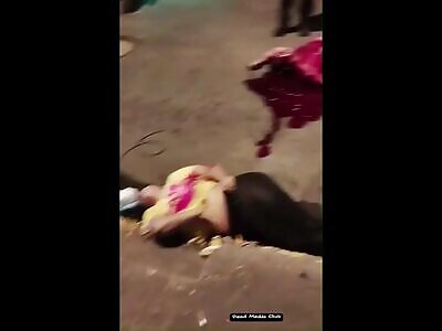 two Venezuelan lovers waited for fares in their humble tricycle