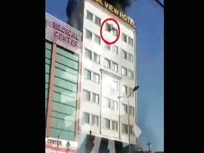 PEOPLE JUMPING FROM A BURNING HOTEL ONE DEATH