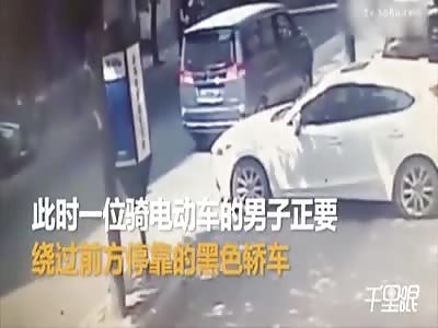 Guy on motorcycle is crushed from behind by a speeding vehicle