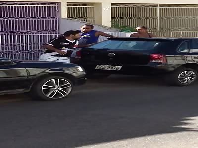 Two men fight and one takes a stab of scratch on the chest