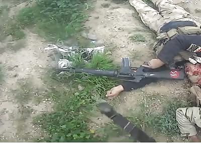 Isis on the battlefield looting and killing