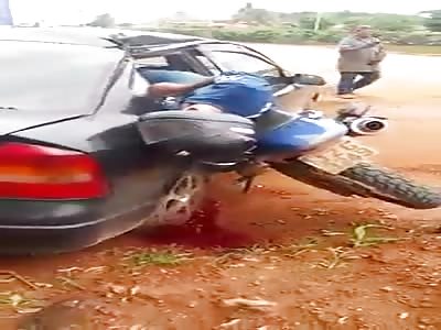 Amazing accident with biker..Ends up in the Back Seat Window? 