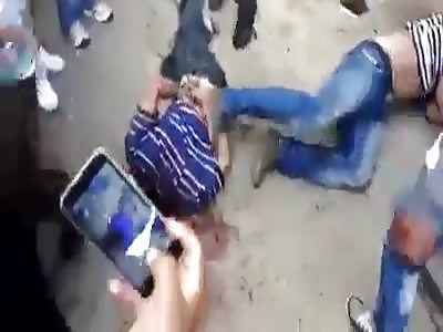 Two thugs brutally littered on the street