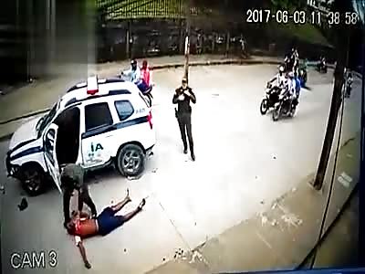 Biker spins in the air after head on collision with police car