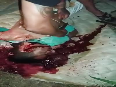 BRUTAL man being Murdered And has the acronyms CV inscribed on the body with a knife