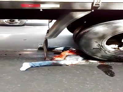 Woman crushed by truck