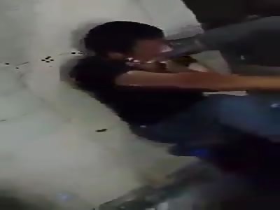 man and beaten with a rubber strap