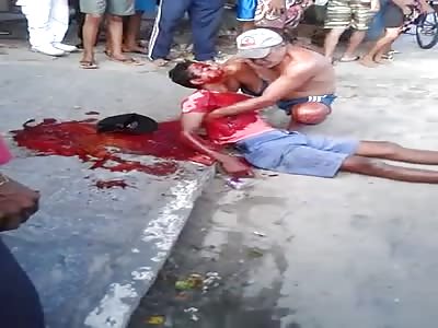 boy in his last moments of life when being shot in the arms of the father