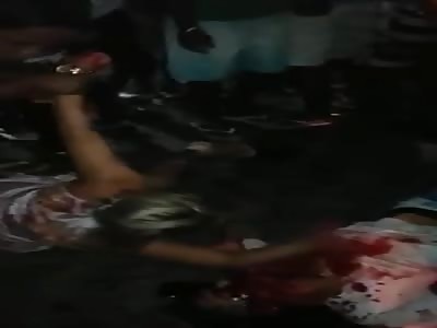 Woman Screaming Next to a Bleeding and Agonal Breathing Man