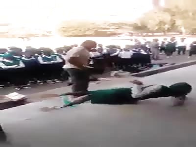 SHOCKING VIDEO SHOWS TEACHER TAKING HIS TURN AND BASHING ONE STUDENT AT A TIME