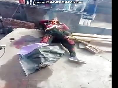 man burning in the bulding 