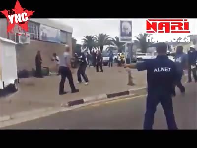 a white African man beats up 2 blacks at the same time