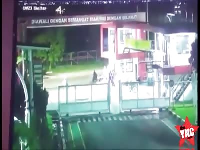 motorcyclist crushed by a car