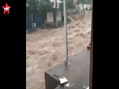 terrible weather a business man washed away in his car