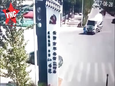 electric car driver crushed under a cement taker