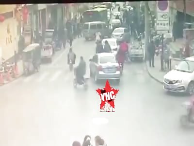 [long shot not zoomed in] many  people crushed by a coach in Zhangjiakou