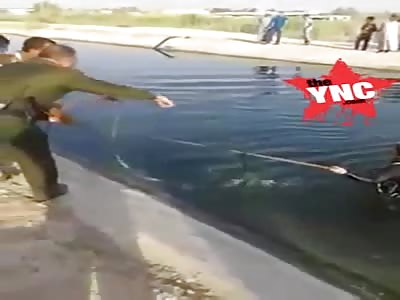 The body of a young man in the water , Karbala 