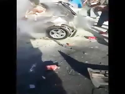 Woman is still alive after car burnt out.