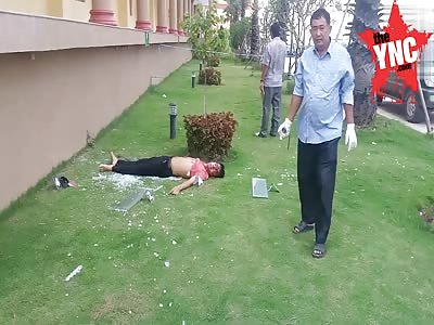 Man lies dead after jumping out of a building