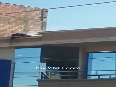 Woman smouldering after being electrocuted by utility cables