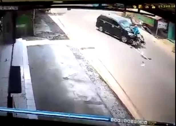 Car Flips Motorcyclist Upside Down