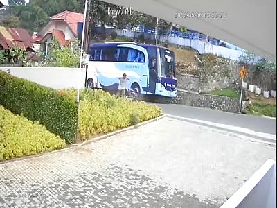 Biker Crushed by a Bus