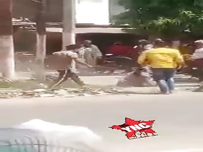 Crowd Beats the Shit out of a Woman Beater.