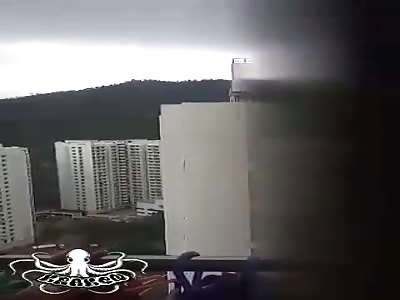 the woman was killed and thrown from the building